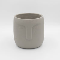 vaso in cemento face still life grigio medio